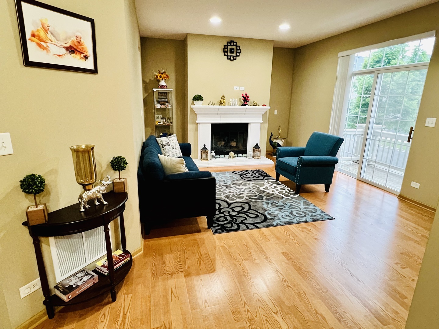 146 Goldenhill Street Carol Stream, IL 60188 - Photo 2 of 18 a living room with furniture rug and a fireplace