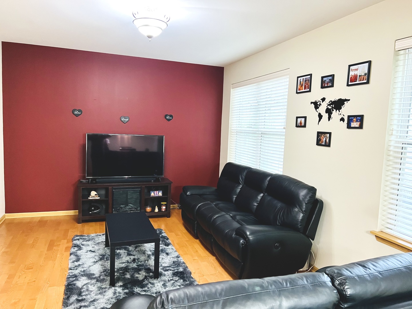 146 Goldenhill Street Carol Stream, IL 60188 - Photo 3 of 18 a living room with furniture and a flat screen tv