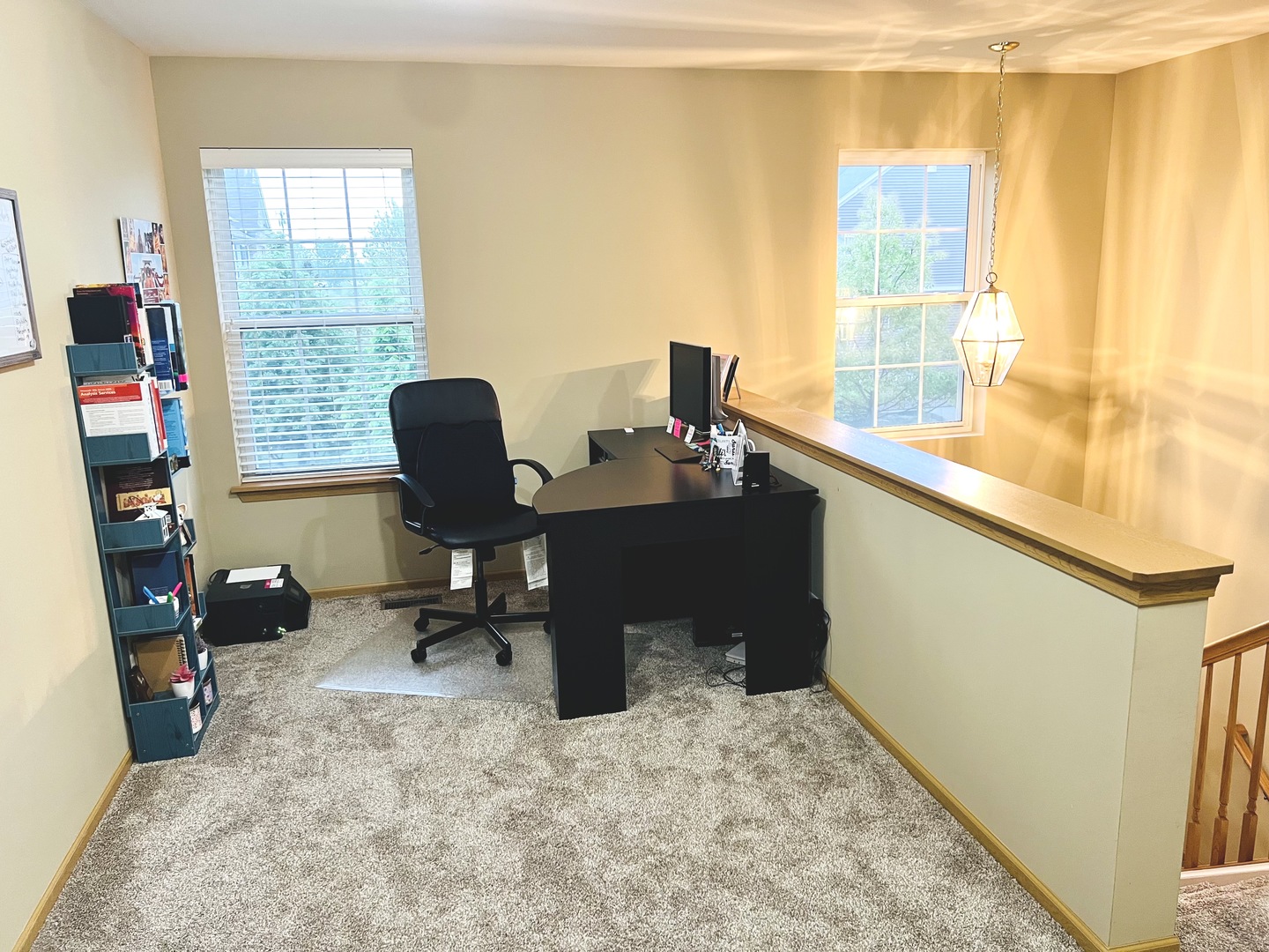 146 Goldenhill Street Carol Stream, IL 60188 - Photo 9 of 18 a view of a workspace with furniture and a window