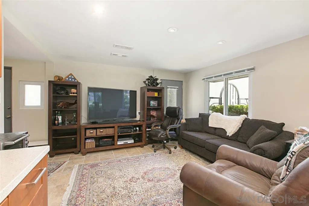 2355 Willow Street San Diego, CA 92106 - Photo 18 of 25 a living room with furniture and a flat screen tv