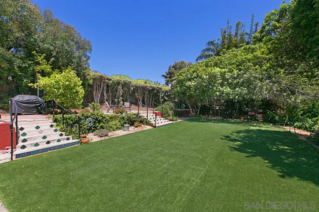 2355 Willow Street San Diego, CA 92106 - Photo 21 of 25 a view of a white house with a yard