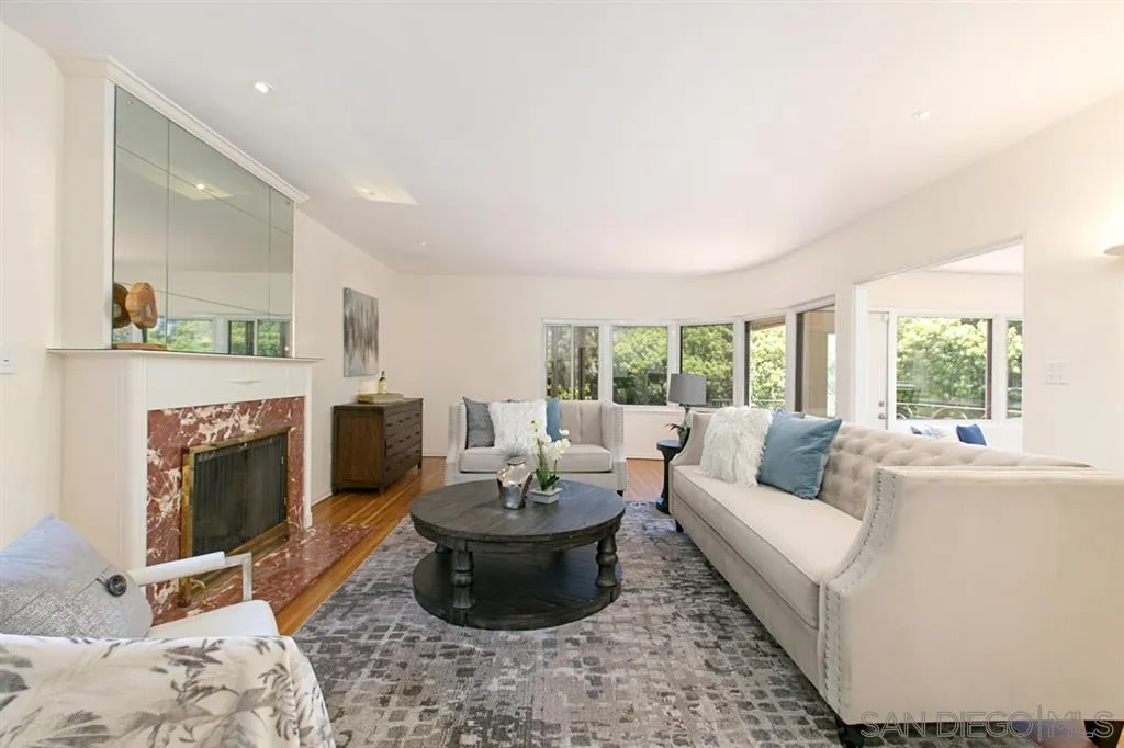 2355 Willow Street San Diego, CA 92106 - Photo 6 of 25 a living room with furniture and a fireplace