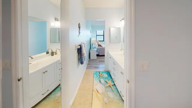 a bathroom with sink and mirror