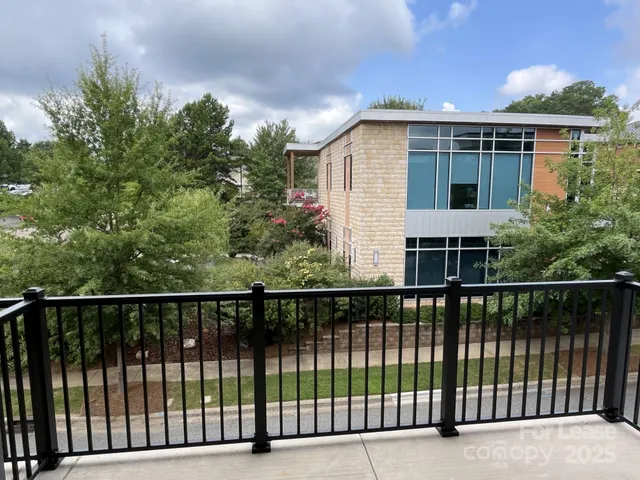 an empty room with wooden floor and closet