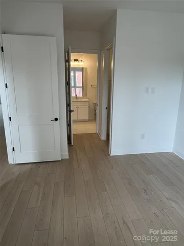 a bathroom with a sink toilet a mirror and vanity