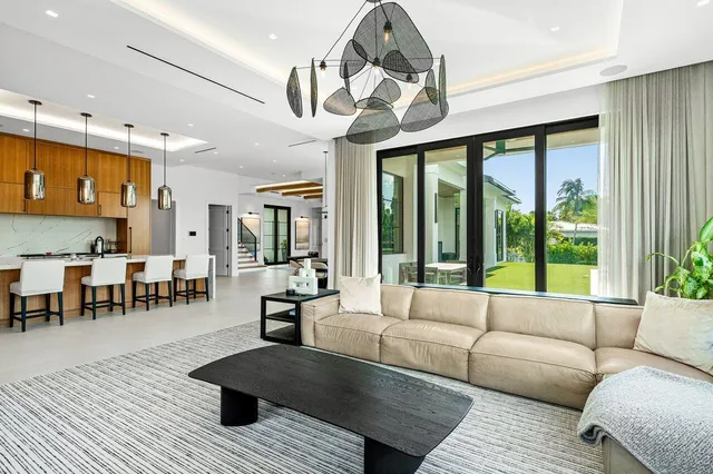 a dining room with a table and chairs