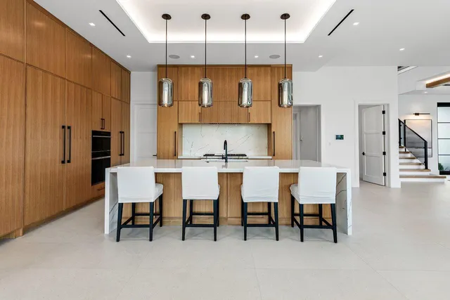 a bedroom with a bed and a lamp