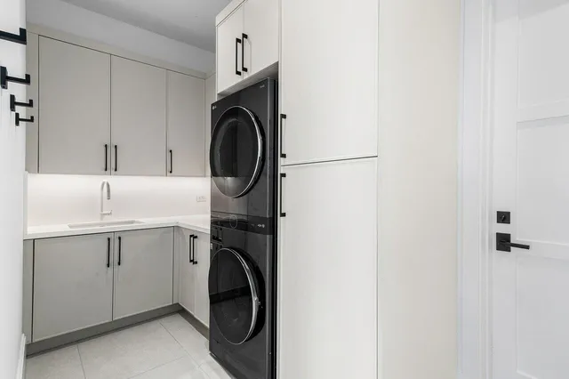 a bedroom with bed and window