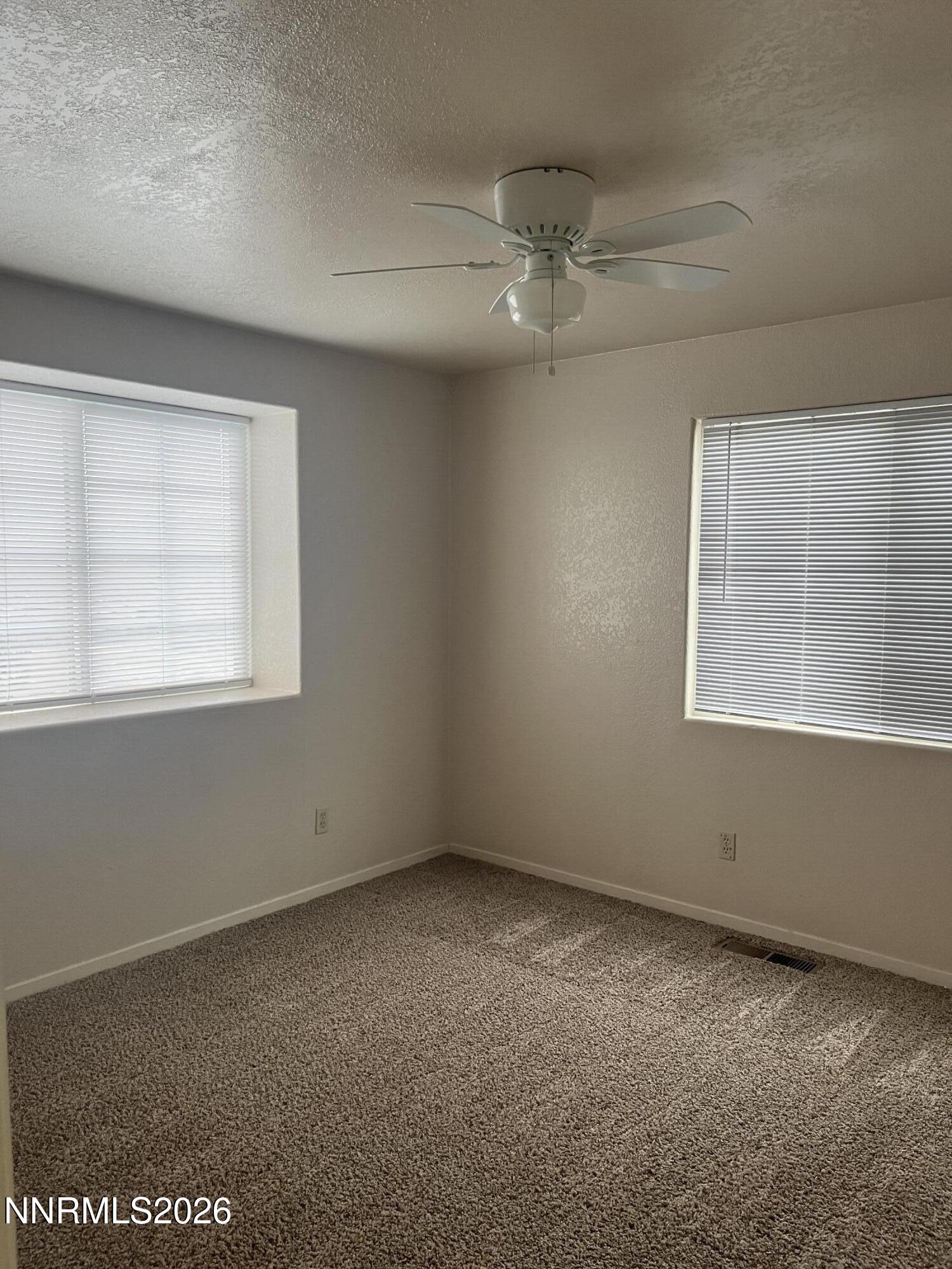 3300 White Lake Parkway Reno, NV 89508 - Photo 12 of 17 an empty room with a window