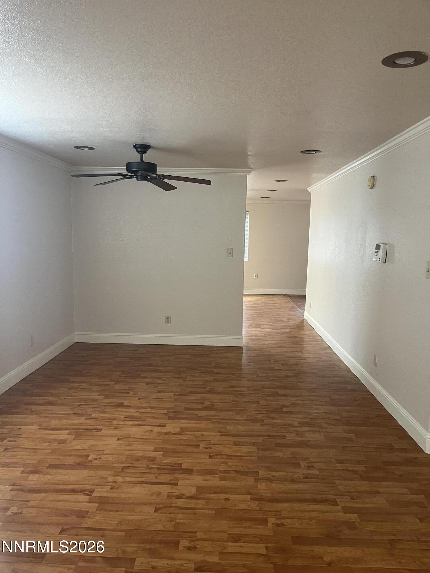 3300 White Lake Parkway Reno, NV 89508 - Photo 3 of 17 a view of a room with wooden floor