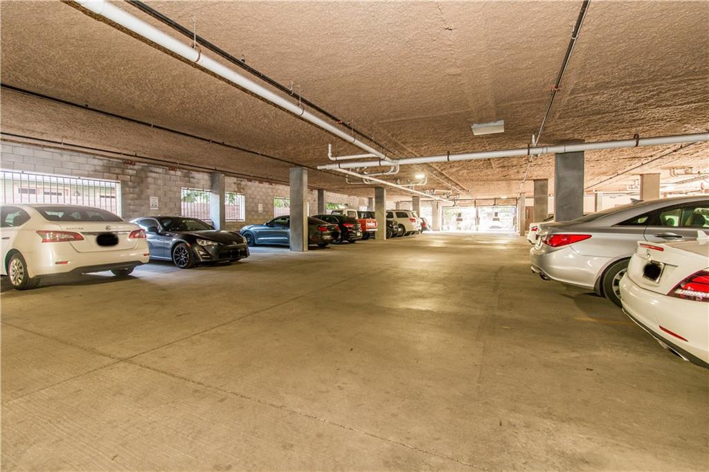 1401 East 4th Street, Unit 312 Austin, TX 78702 - Photo 6 of 16 a view of parking garage with cars