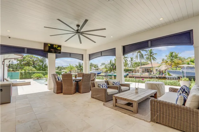 a view of a lake with a house in the background