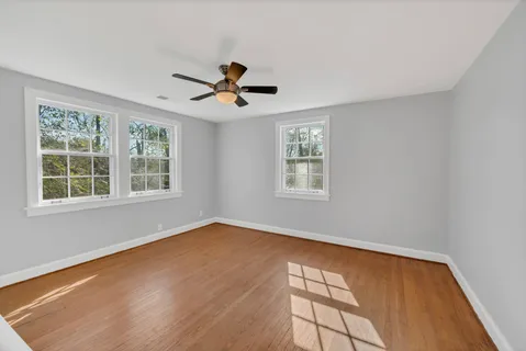 a view of empty room with windows