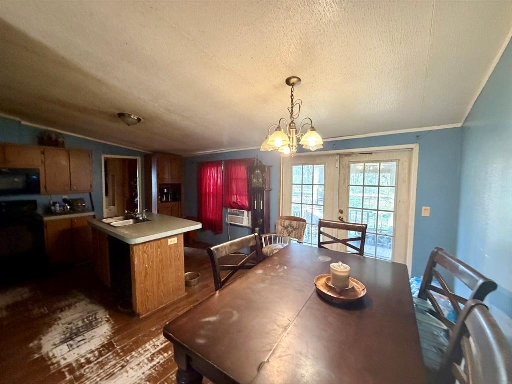 721 Richardson Road Stonewall, LA 71078 - Photo 3 of 11 a view of a kitchen and workspace