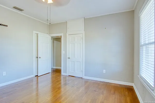 an empty room with windows