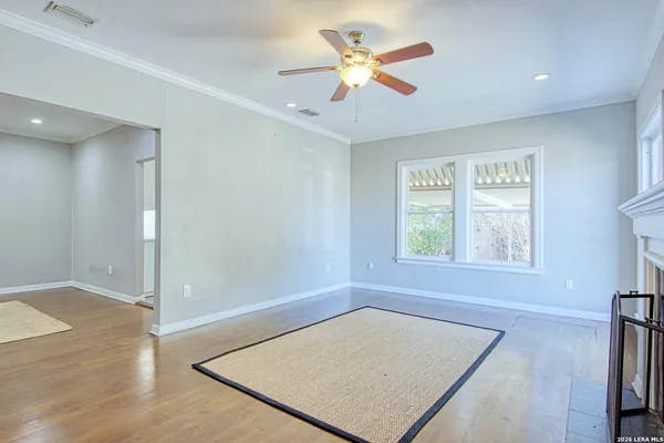 a view of an empty room with a window