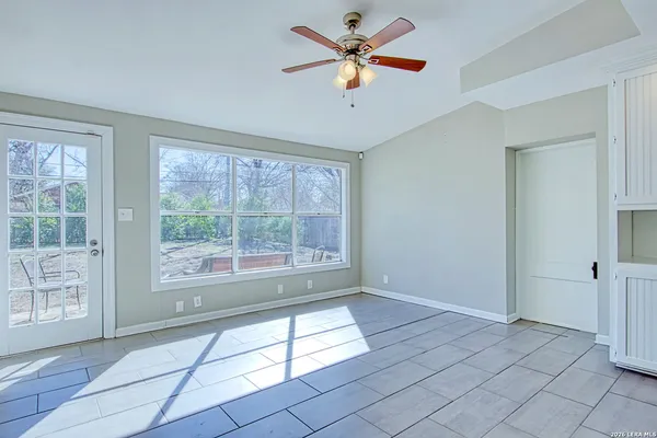 a view of a kitchen with a sink and cabinet area