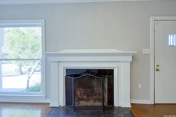 a living room with a fireplace