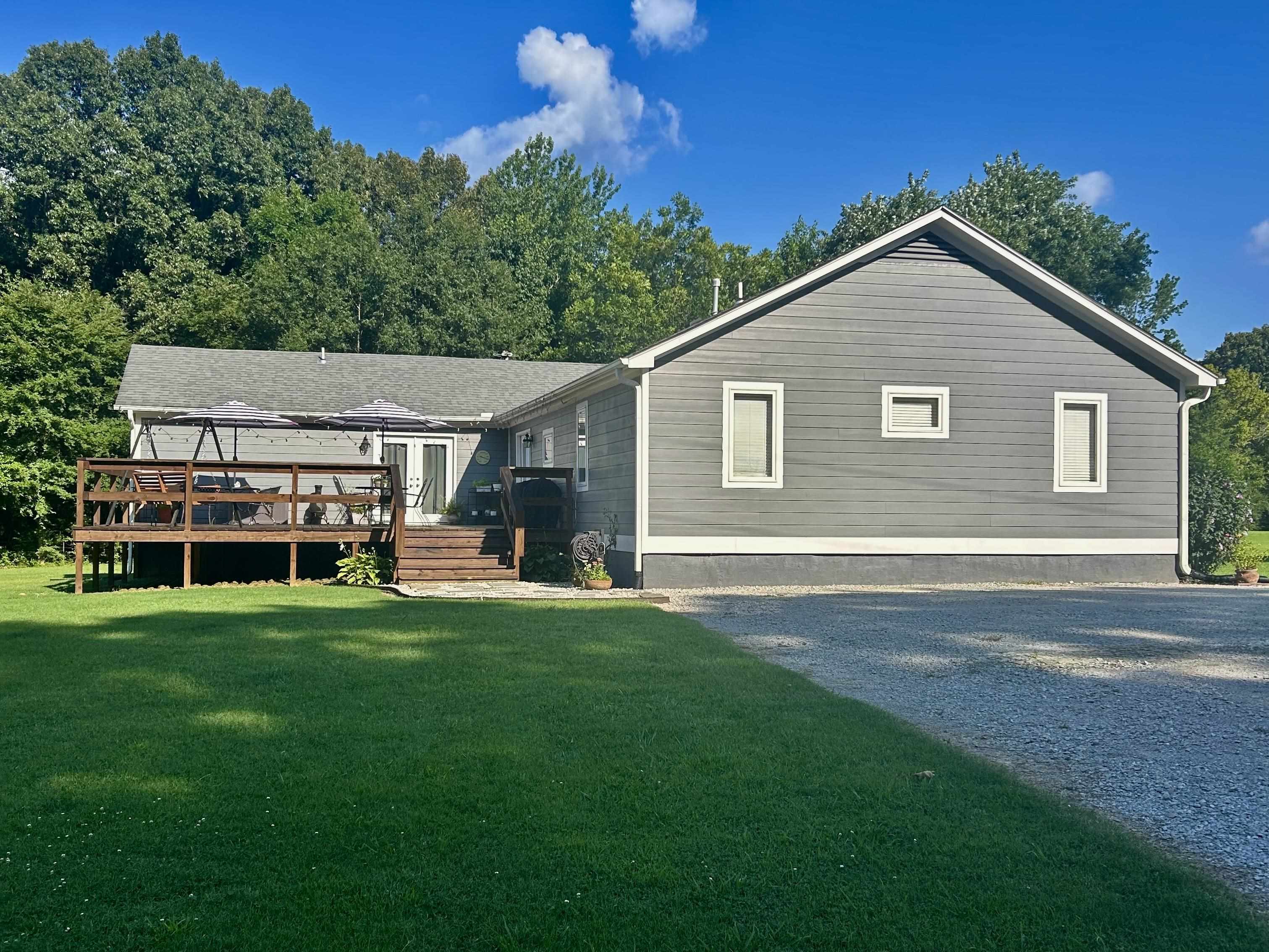 6195 Bobbitt Road Moscow, TN 38057 - Photo 6 of 40 a view of a house with a yard