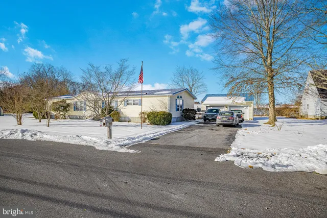 a view of street with parked cars