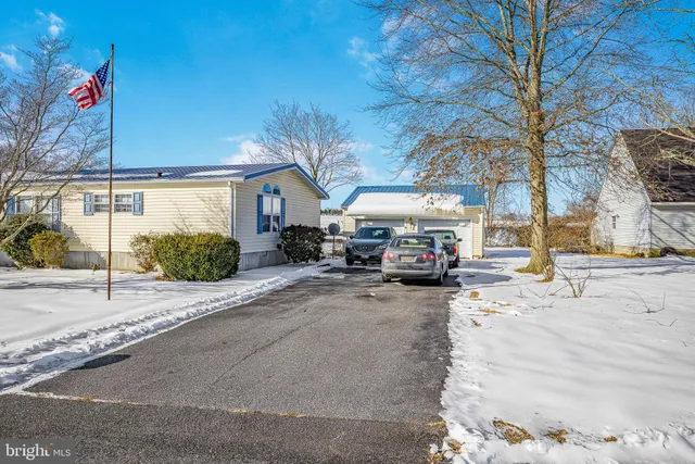 a view of a street with cars