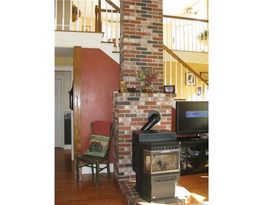 109 Deertrees Road Harrison, ME 04040 - Photo 6 of 20 Living Room. Pellet Stove
