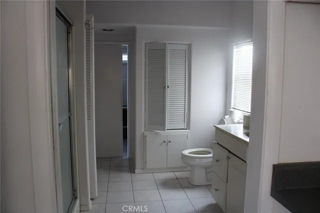 a bathroom with a toilet sink and tub