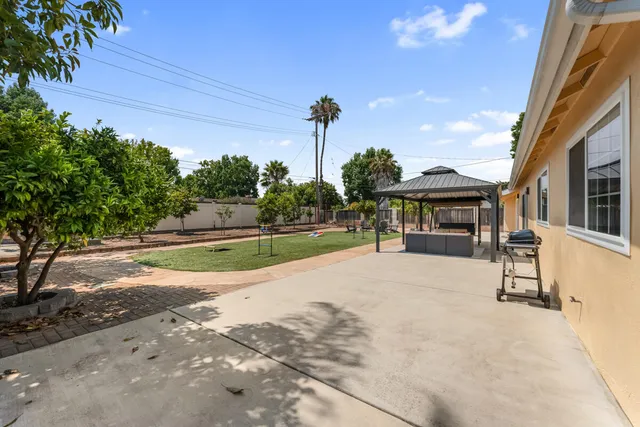 a view of a house with a swimming pool