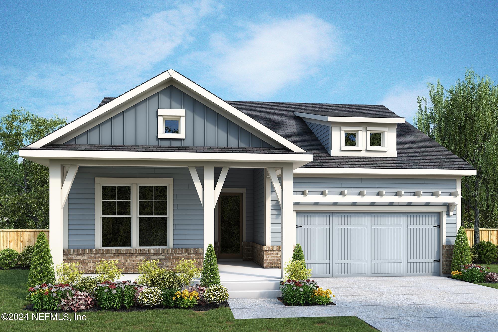5590 Pathfinder Road Jacksonville, FL 32224 - Photo 1 of 1 a front view of a house with a garden