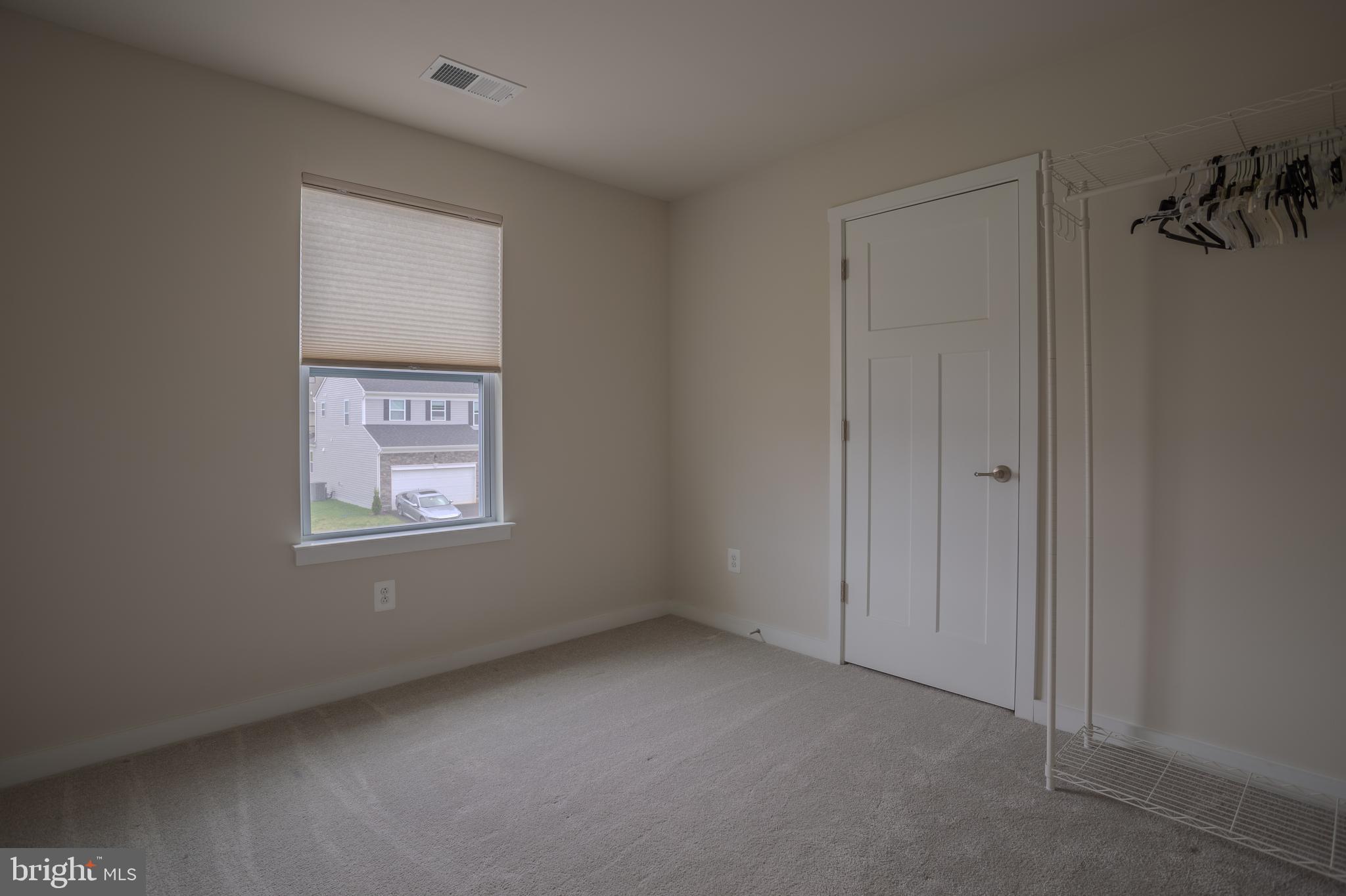 503 Boise Road Inwood, WV 25428 - Photo 39 of 83 a view of an empty room with a window
