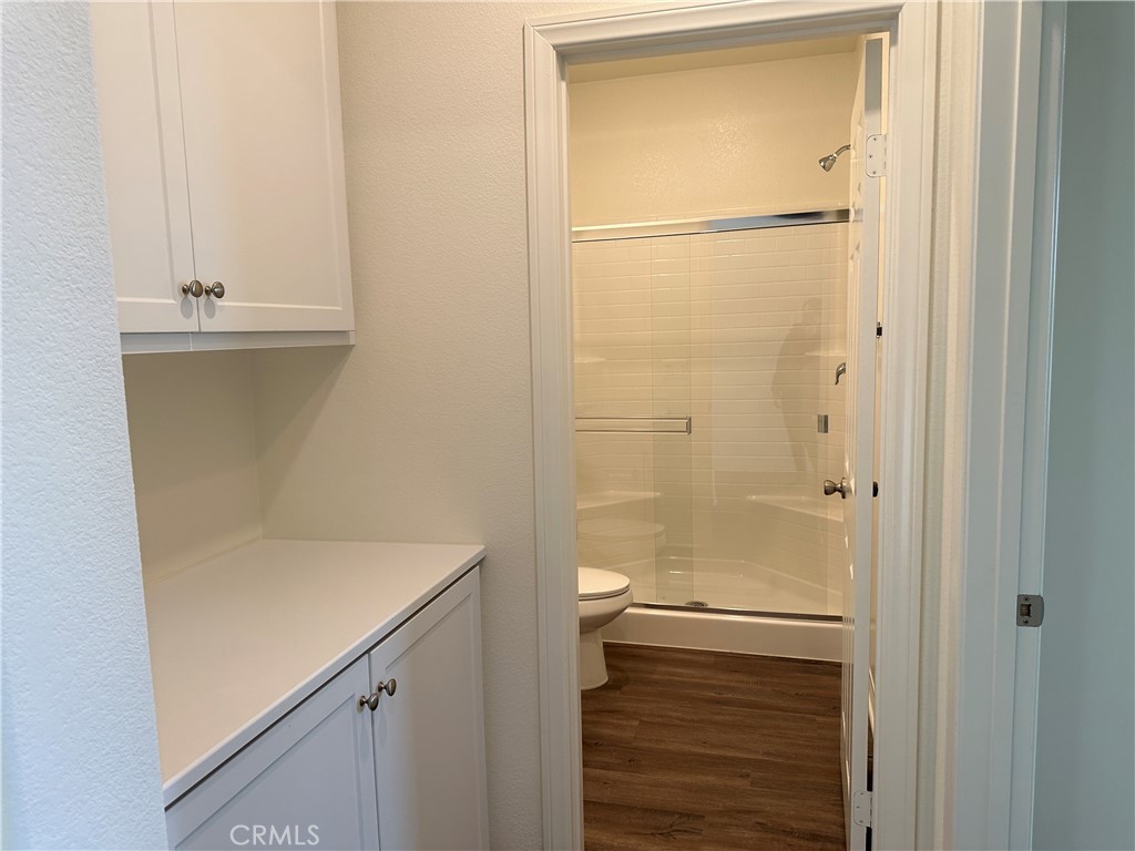 7560 Citrusmoon Court Riverside, CA 92507 - Photo 15 of 18 a bathroom with a shower