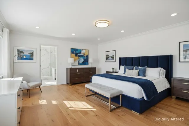 a living room with furniture a fireplace and a table