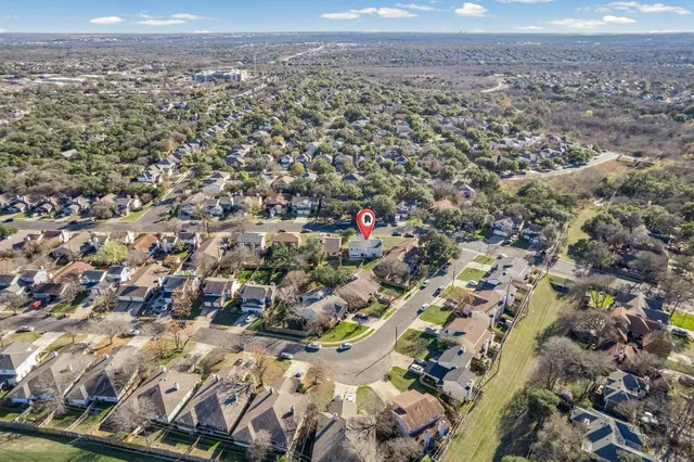 an aerial view of residential building and lake view