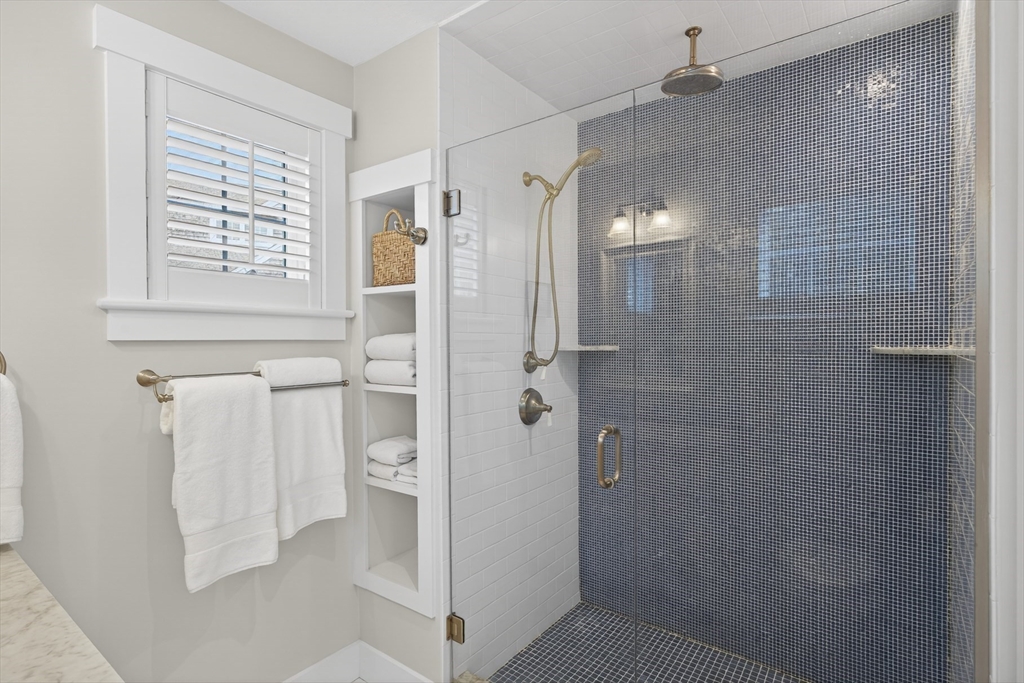 23 Cobblestone Plymouth, MA 02360 - Photo 20 of 39 a bathroom with a shower and toilet