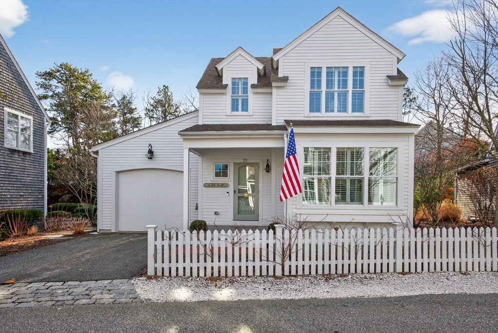 23 Cobblestone Plymouth, MA 02360 - Photo 2 of 39 a front view of a house with a yard
