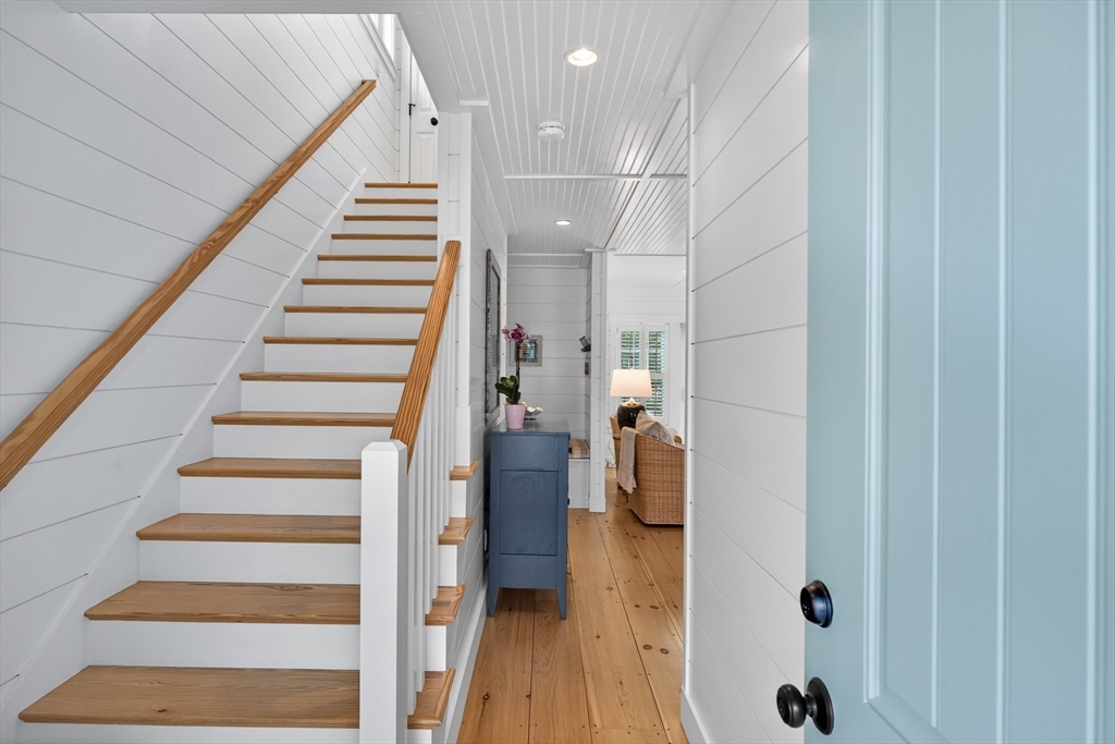 23 Cobblestone Plymouth, MA 02360 - Photo 21 of 39 a view of entryway and hall with wooden floor