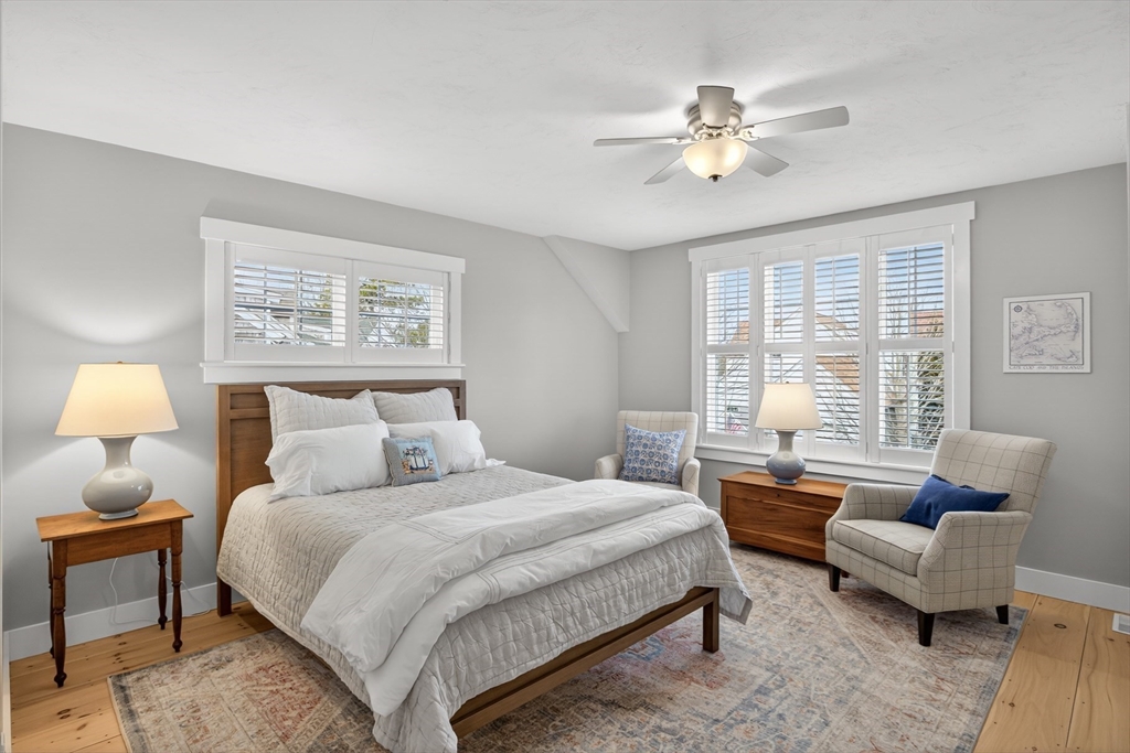 23 Cobblestone Plymouth, MA 02360 - Photo 22 of 39 a bedroom with bed and a couch