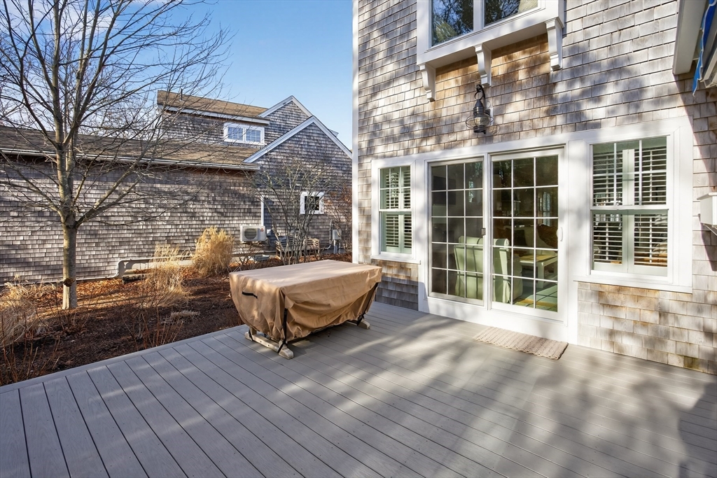 23 Cobblestone Plymouth, MA 02360 - Photo 34 of 39 a view of a house with backyard and sitting area