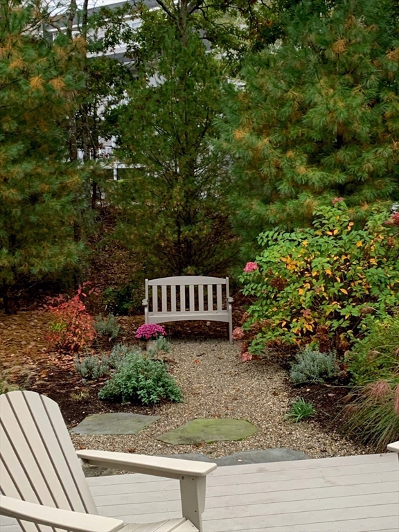 23 Cobblestone Plymouth, MA 02360 - Photo 38 of 39 a view of a house with a yard and potted plants