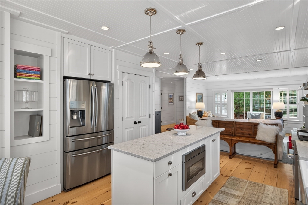 23 Cobblestone Plymouth, MA 02360 - Photo 8 of 39 a open kitchen with stainless steel appliances granite countertop a stove and a refrigerator