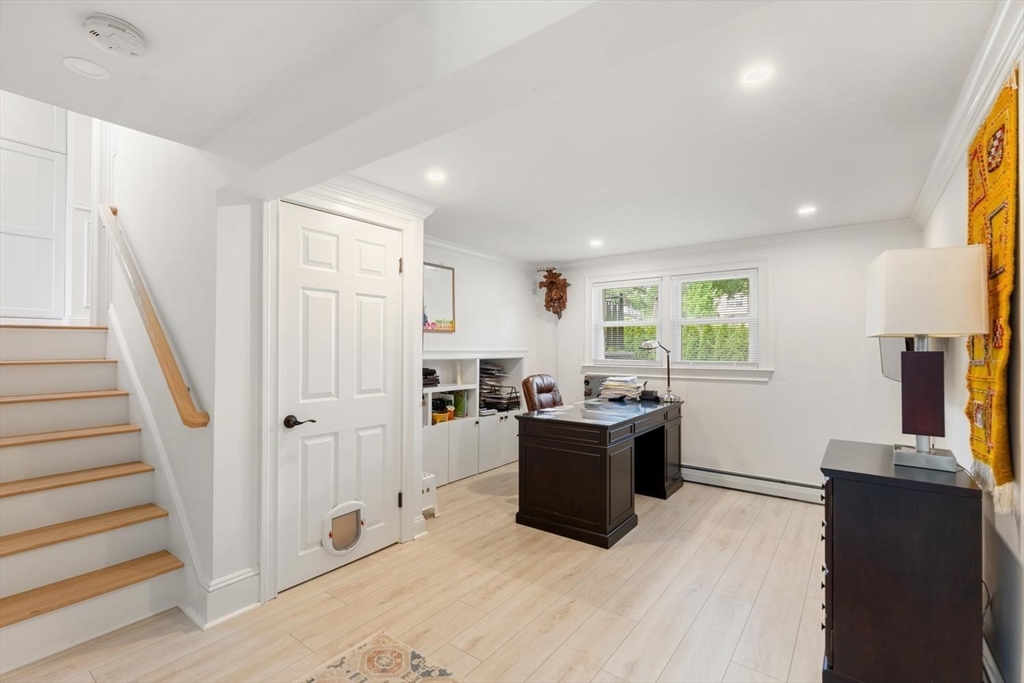 155 Adams Avenue Newton, MA 02465 - Photo 29 of 37 a view of a workspace with furniture and a window