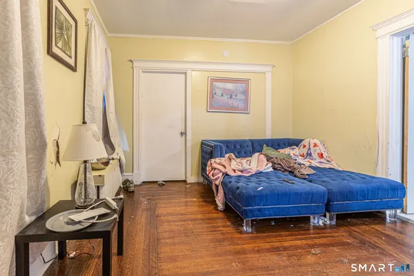 a bed room with a bed and a window