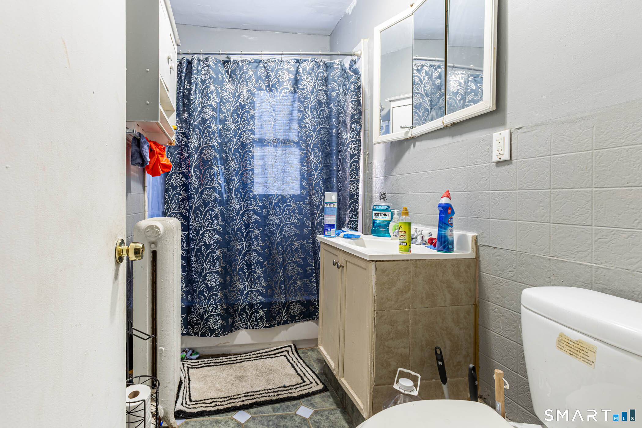 34 Adams Street Hartford, CT 06112 - Photo 13 of 39 a bathroom with a toilet and a shower