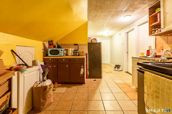 a view of a walk in the balcony with chairs