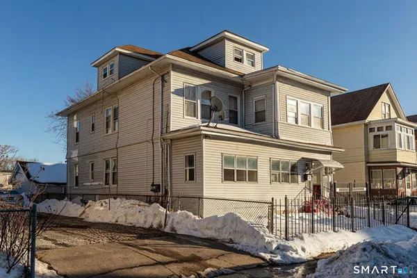 front view of a house with a street
