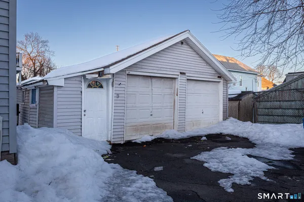 a view of a house with wooden deck