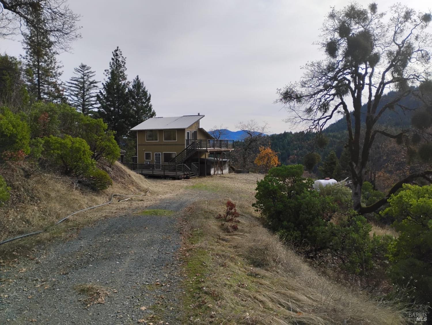 7601 Simmerly Road Laytonville, CA 95454 - Photo 21 of 30 a car parked in front of a house