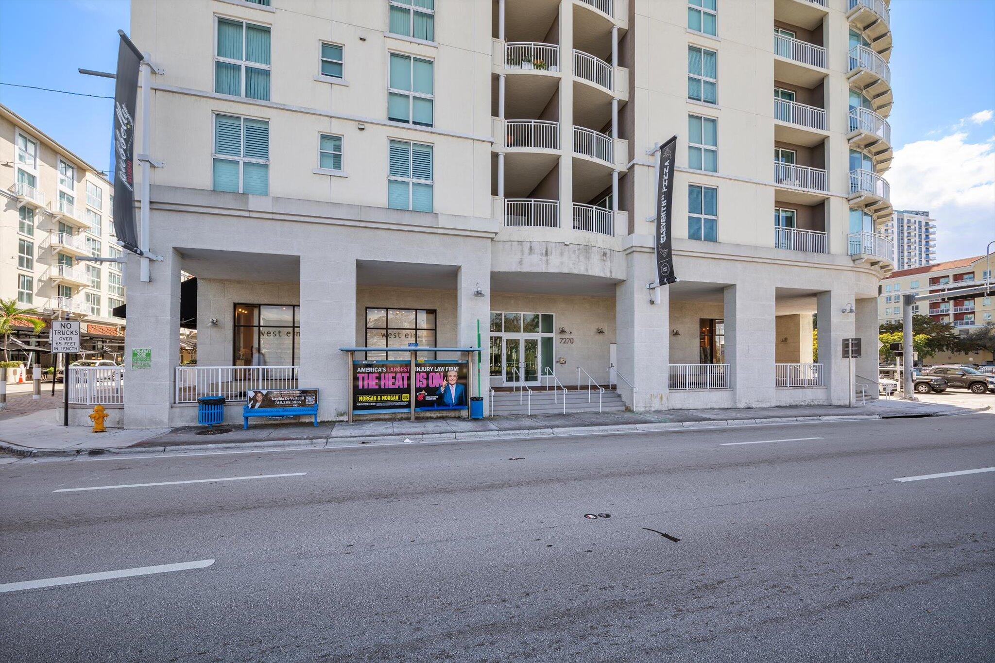 7270 Southwest 88th Street, Unit B203 Miami, FL 33156 - Photo 25 of 27 a view of a building on a street