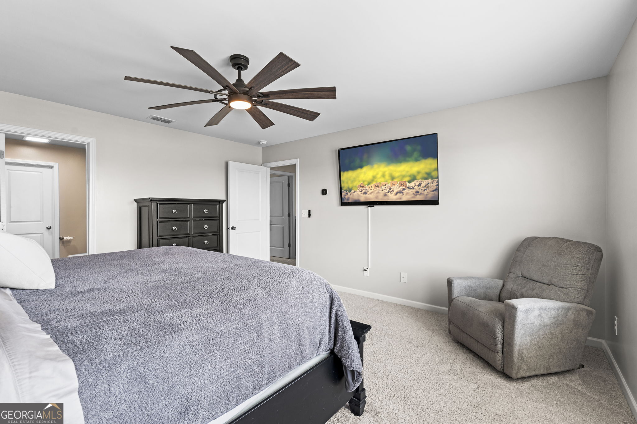 238 Isabella Way Byron, GA 31008 - Photo 27 of 37 a living room with furniture and a flat screen tv