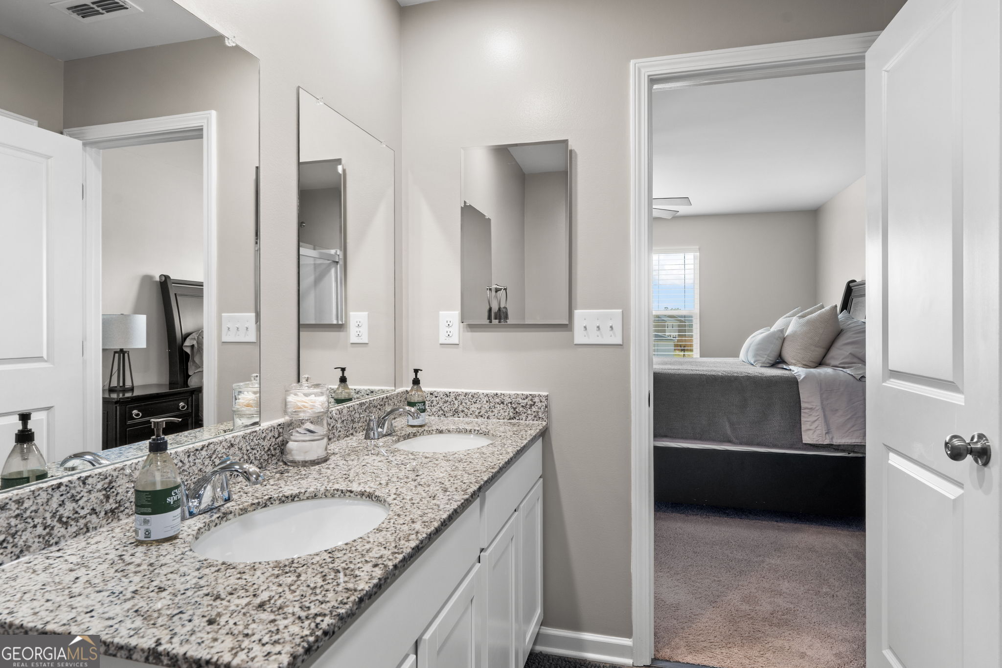 238 Isabella Way Byron, GA 31008 - Photo 32 of 37 a bathroom with a granite countertop sink and a mirror